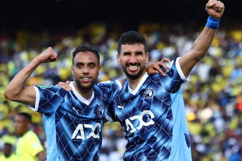 احتفال وليد الكرتي ومحمد الشيبي خلال مباراة بيرامي